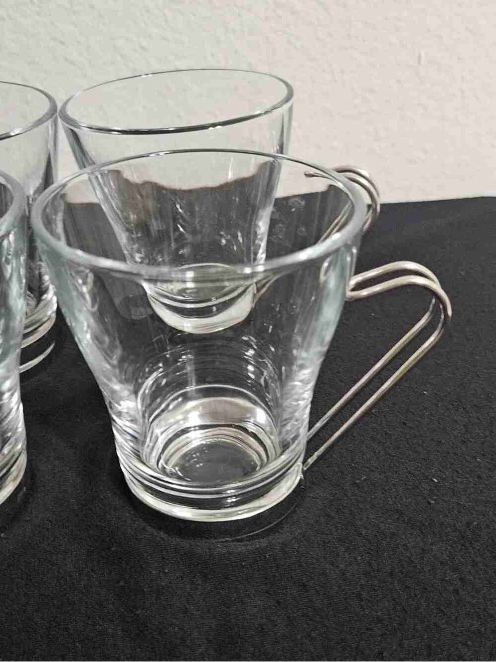 Clear Glass Tea Cup with Sleek Metal Handle